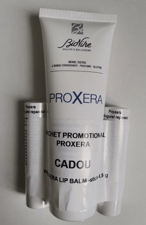 Bionike Pachet Proxera Crema maini piele uscata si foarte uscata 75 ml + Balsam buze uscate 4.5 g 2 bucati